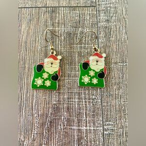 Vintage women’s Klein International stamped red green Christmas Santa earrings